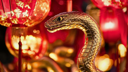 Cover image featuring a stylized snake winding among red lanterns and gold accents, celebrating Chinese New Year, Lunar New Year, 2025 in the Year of the Snake.